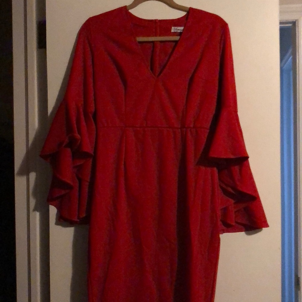Knee length red dress with flowy sleeves